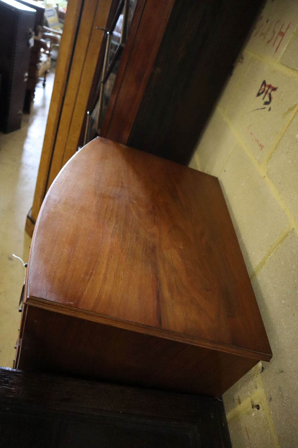 A reproduction walnut bow front six drawer chest, width 63cm depth 43cm height 123cm